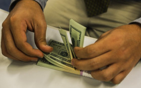 Bolsa cai 1,2%, e d&oacute;lar sobe para R$ 5,13 com tens&atilde;o global