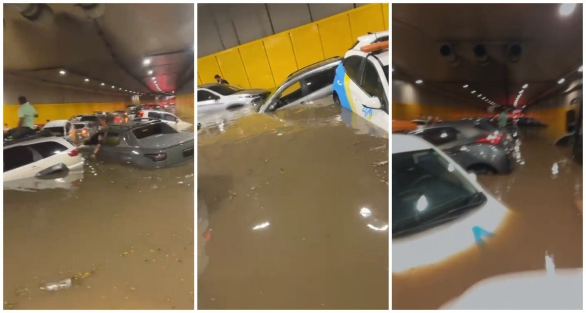Carros e &ocirc;nibus boiam em t&uacute;nel ap&oacute;s temporal